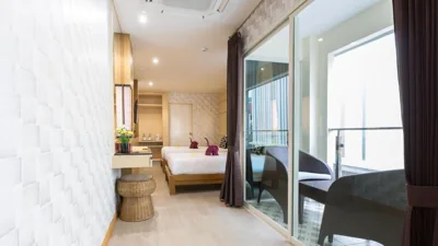 Habitación con 2 camas individuales y balcón — Anda Beachside Hotel